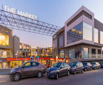 محل دور ارضي للبيع فيthe market mallالقاهره الجديده علي محور جمال عبدالناصر قسط علي 4 سنين